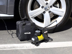 EPAuto inflator attached to car tire demonstrating quick inflation for safer driving