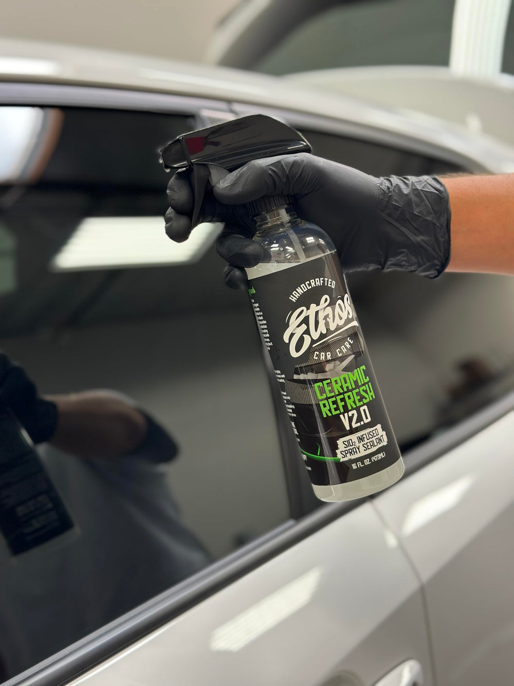 Ethos Handcrafted Car Care painted panel before and after showing restored gloss