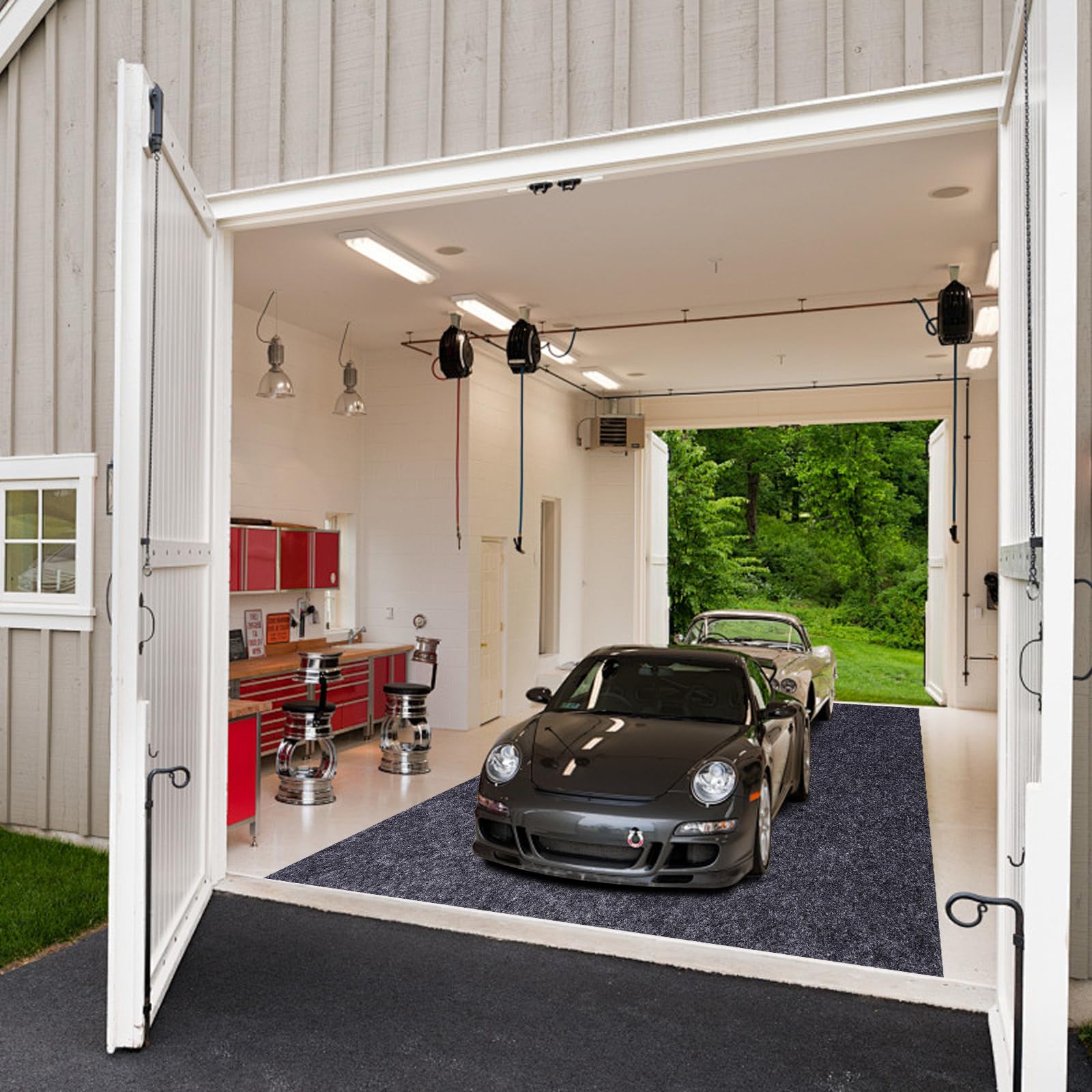 Evercomfy mat installed under a car protecting garage floor from spills