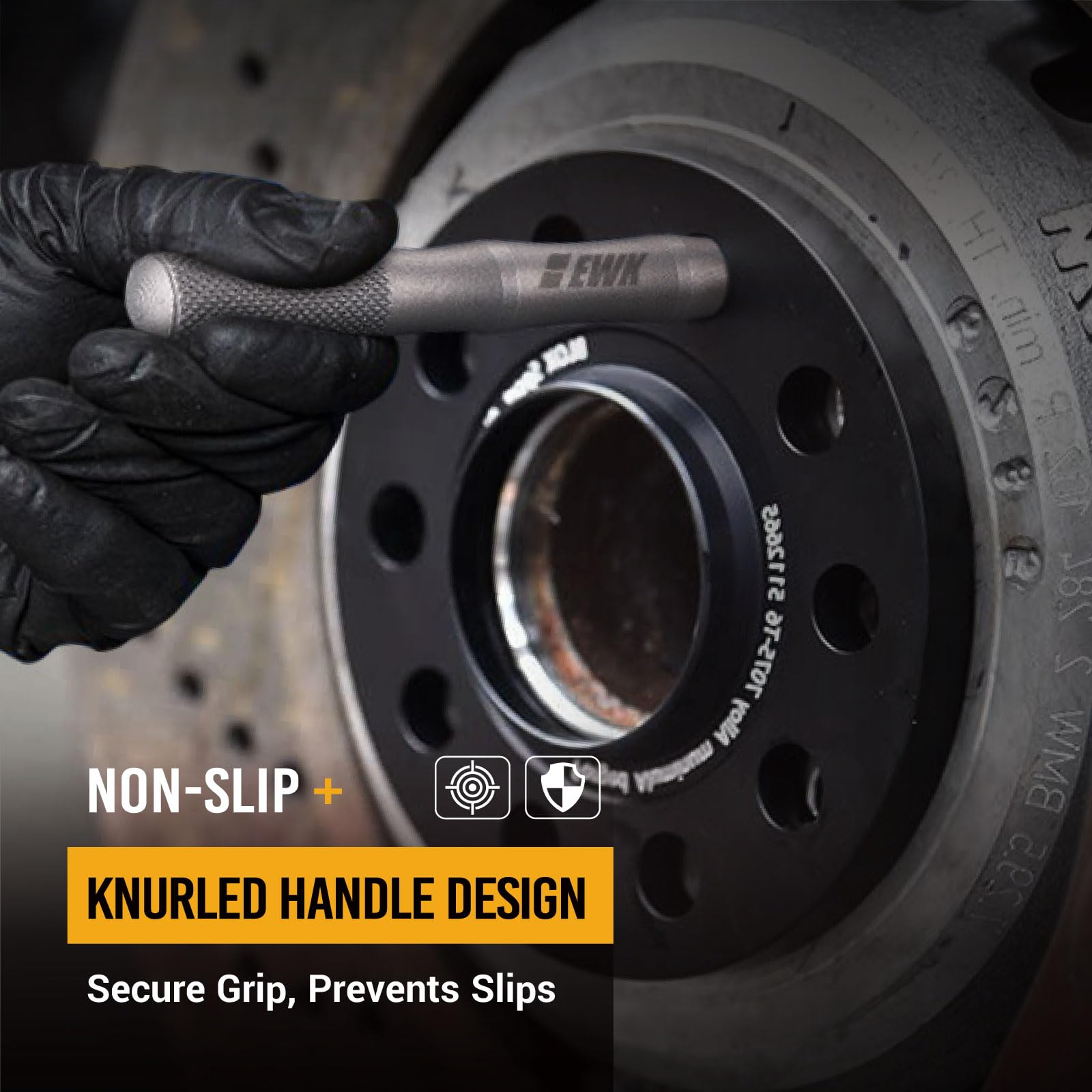 EWK holding a rim in place while a single person starts lug bolts safely