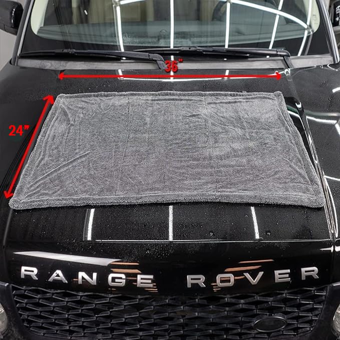 ExoForma towel drying windshield in use offering clear, streak-free glass benefit
