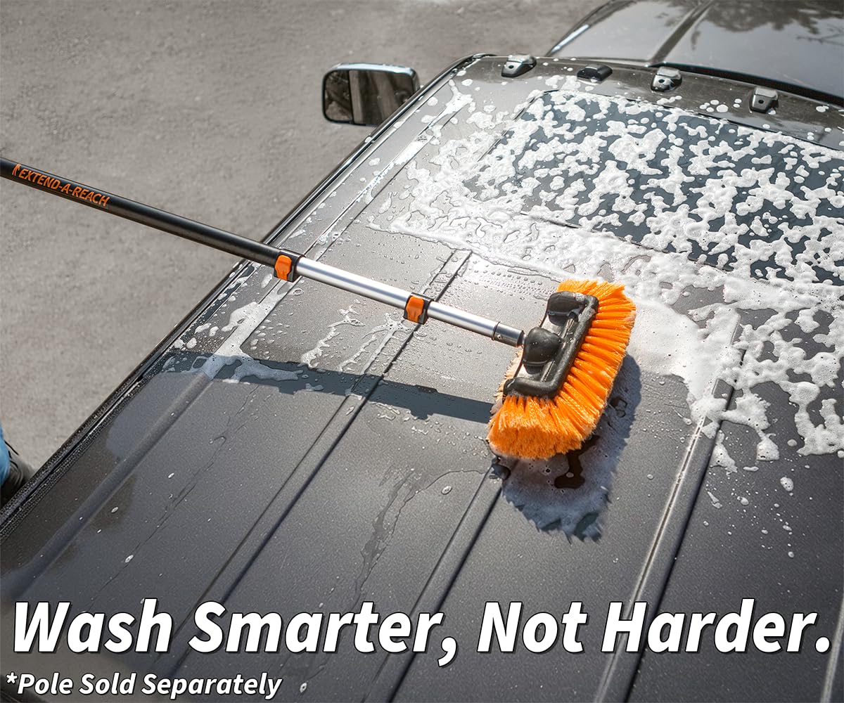 EXTEND-A-REACH brush in use washing a car roof with foam, reaching high areas safely