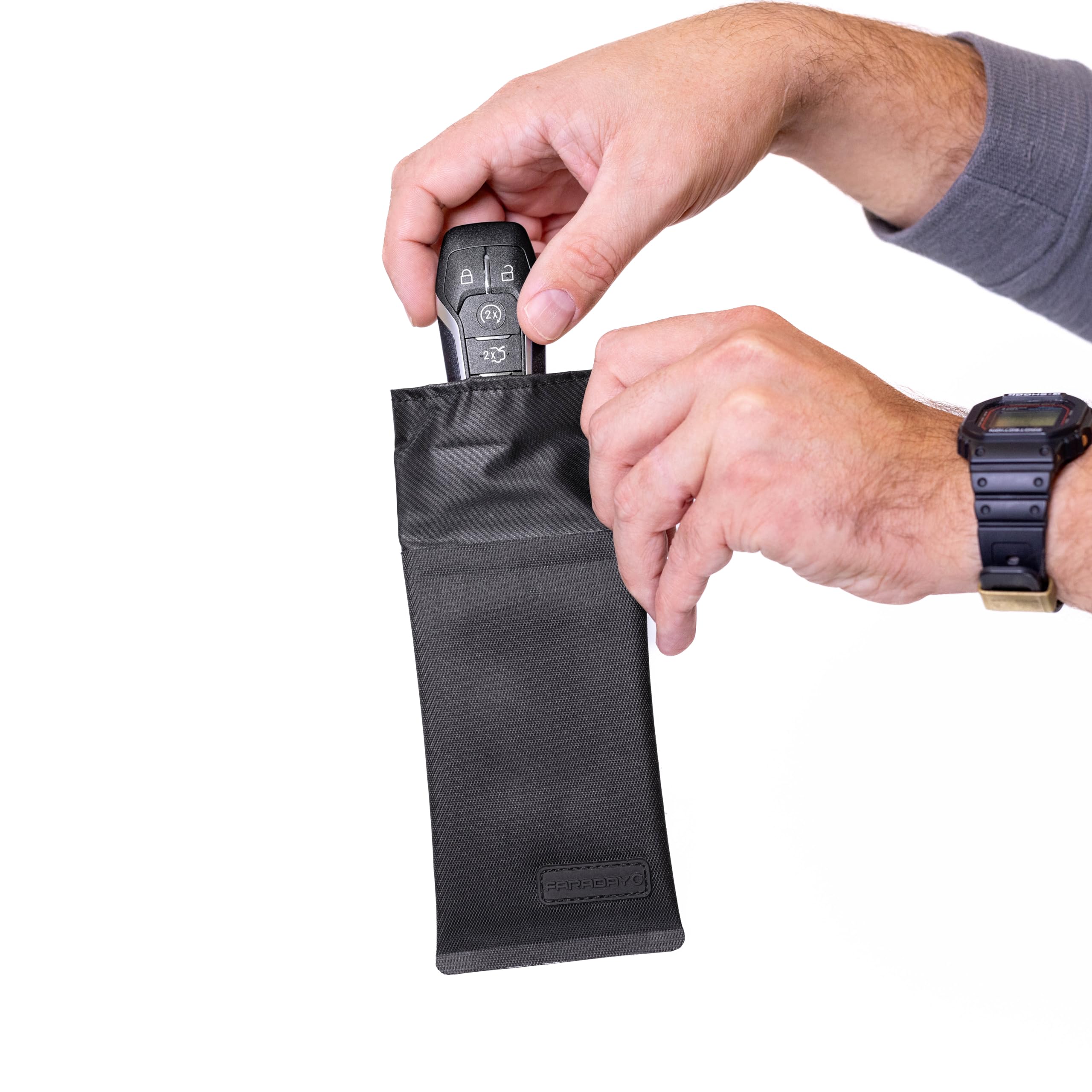 Faraday Defense jacket repelling water droplets to show water-resistant TPU exterior protection