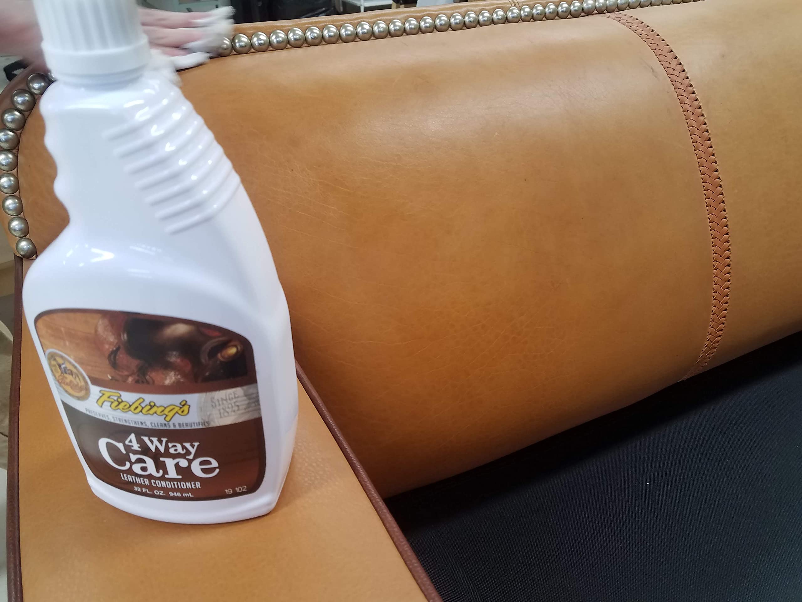 Fiebing's spray applied to car upholstery showing protection and restored appearance