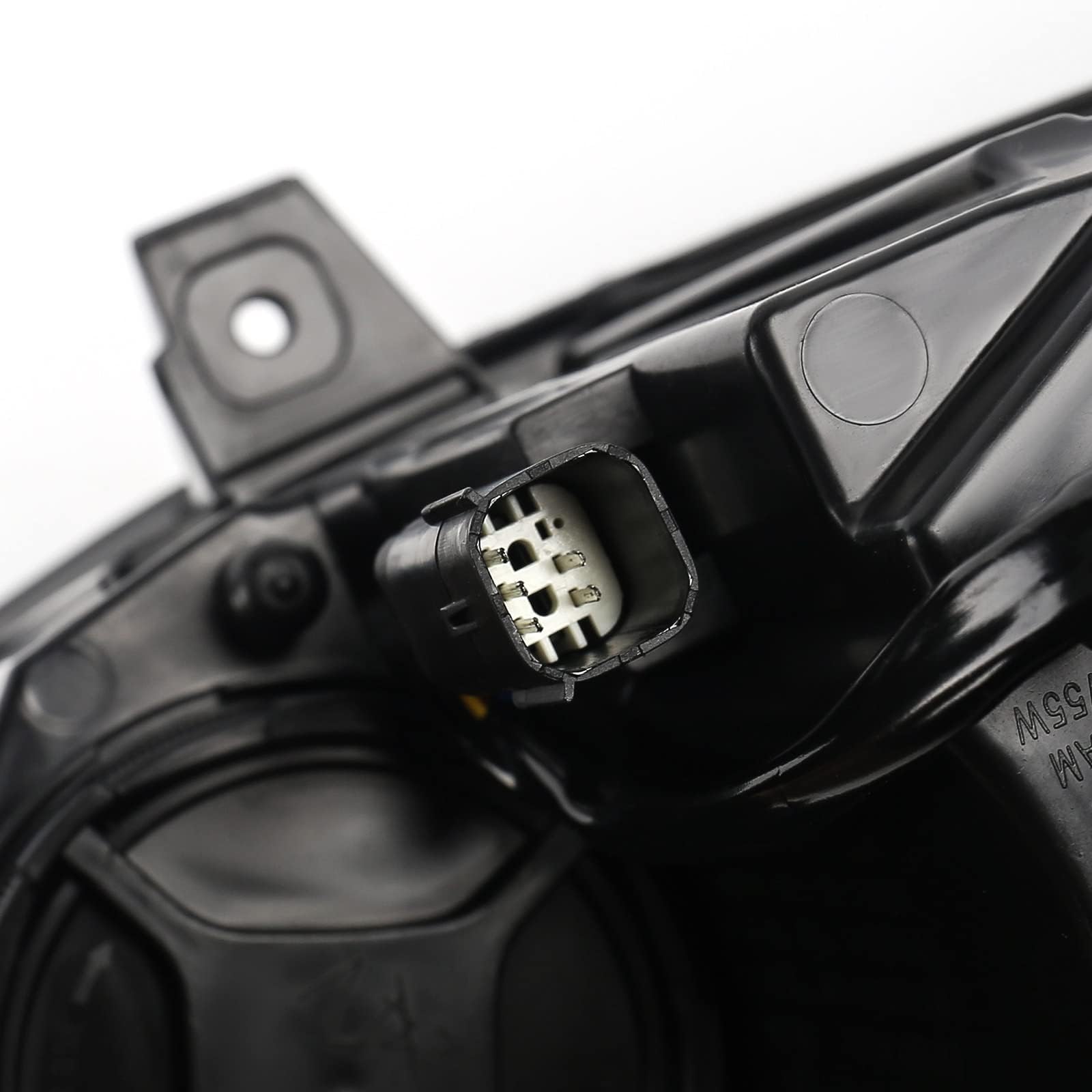 FIONE packaged headlight with label showing part numbers for simple identification benefit