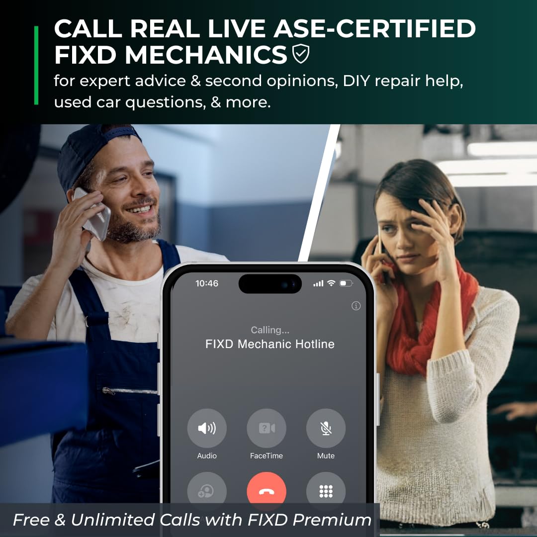 Mechanic using FIXD app with sensor in car for faster troubleshooting