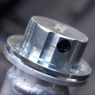 Flow Security Systems fuel cap on worksite showing practical security for jobsite fuel