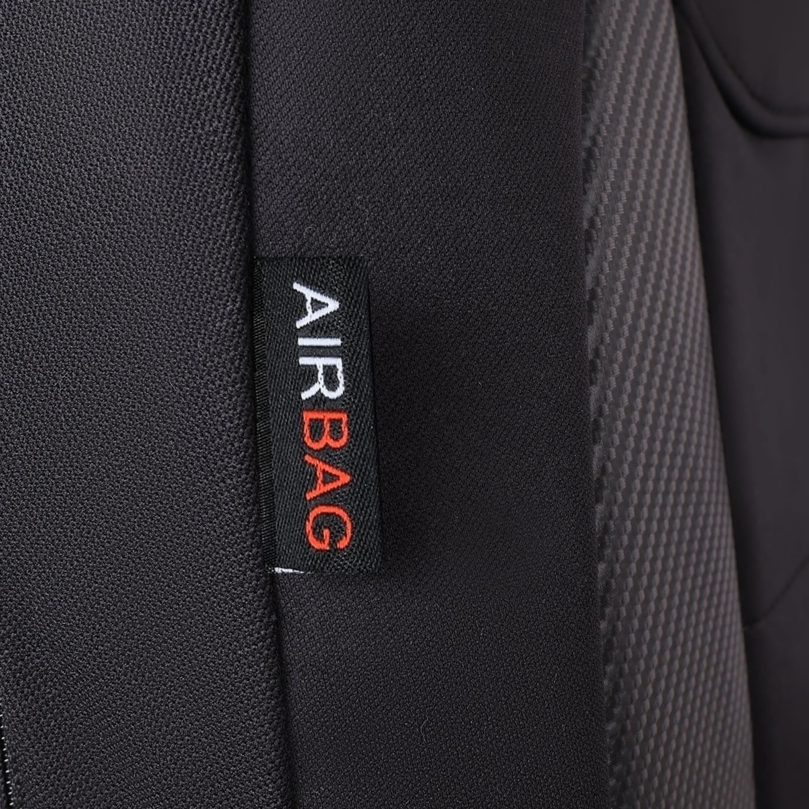 Flying Banner anti-slip backing detail reducing cover movement during driving