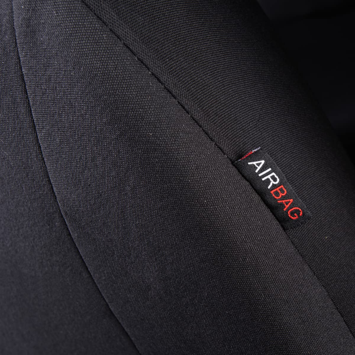 Flying Banner seat cover in use on driver side showing easy refresh benefit