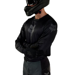 Fox Racing back view highlighting drop-tail hem for secure tuck and coverage