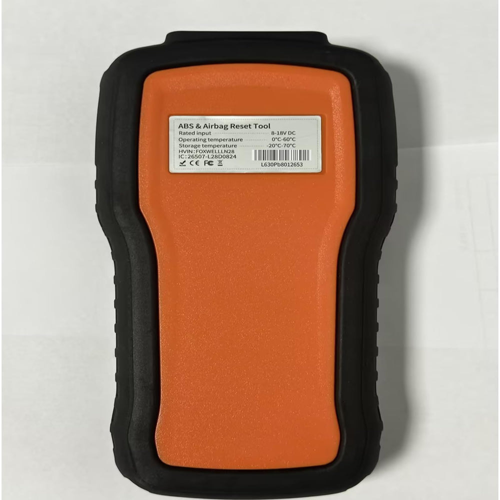 FOXWELL NT630 Plus used in a garage setting, practical for DIY and pro mechanics