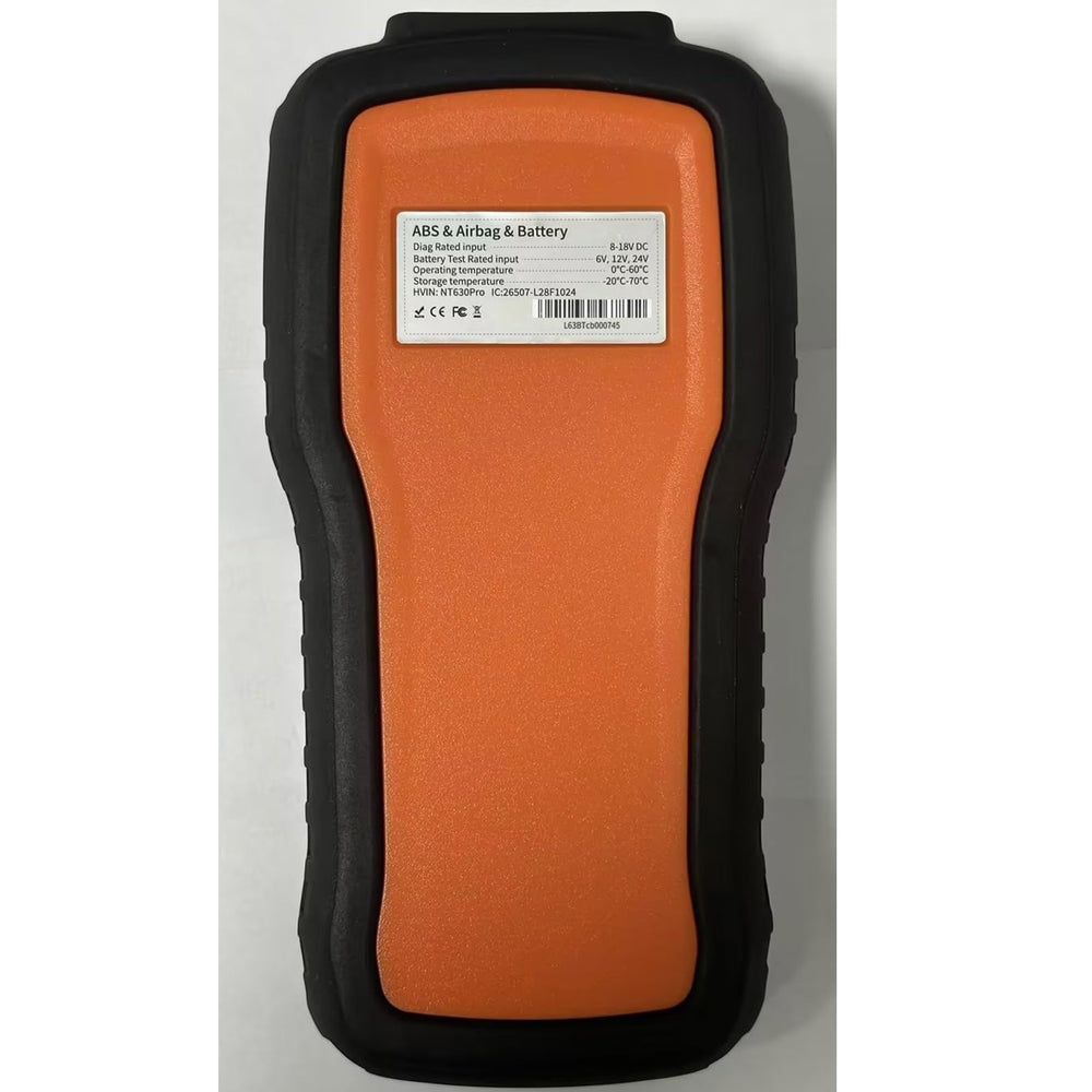 FOXWELL NT630 Pro on garage bench diagnosing car problems for DIY mechanics