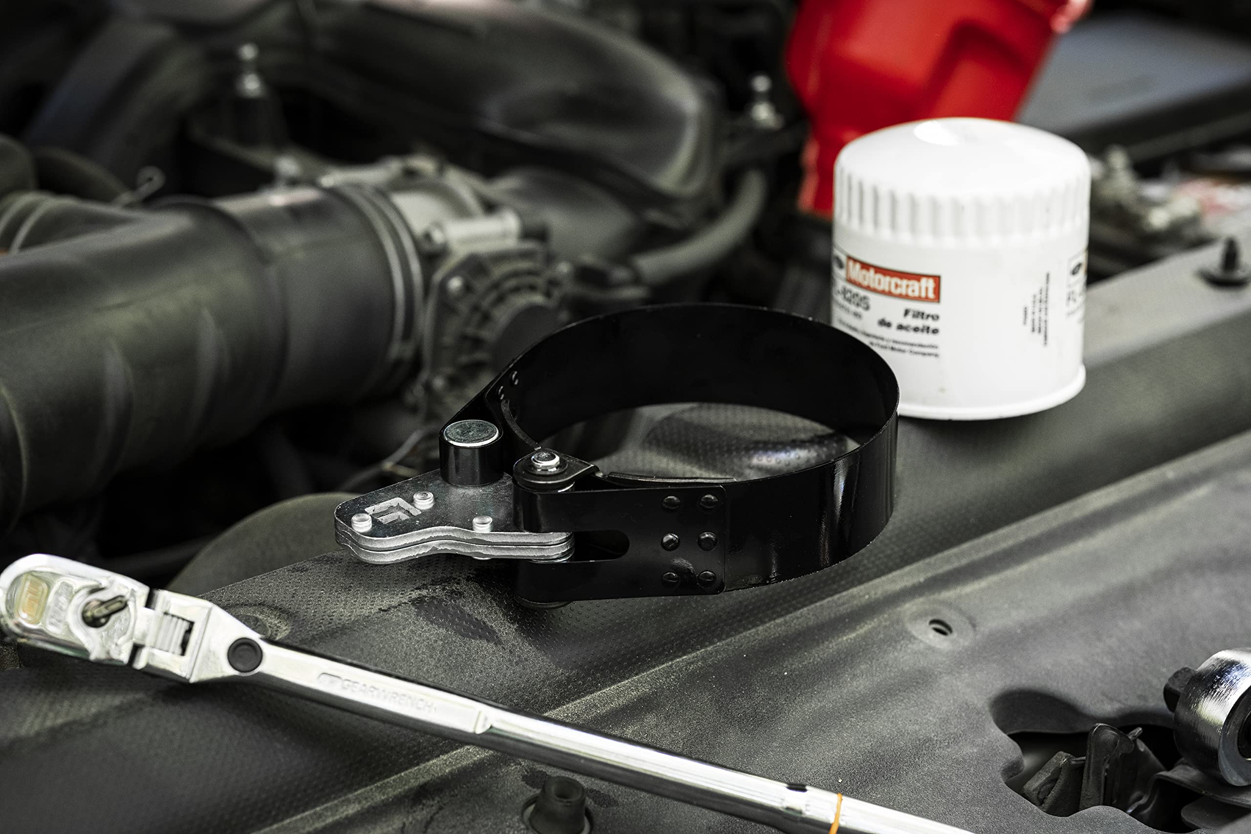 GEARWRENCH wrench beside a 1/2" ratchet showing scale and compatibility benefit