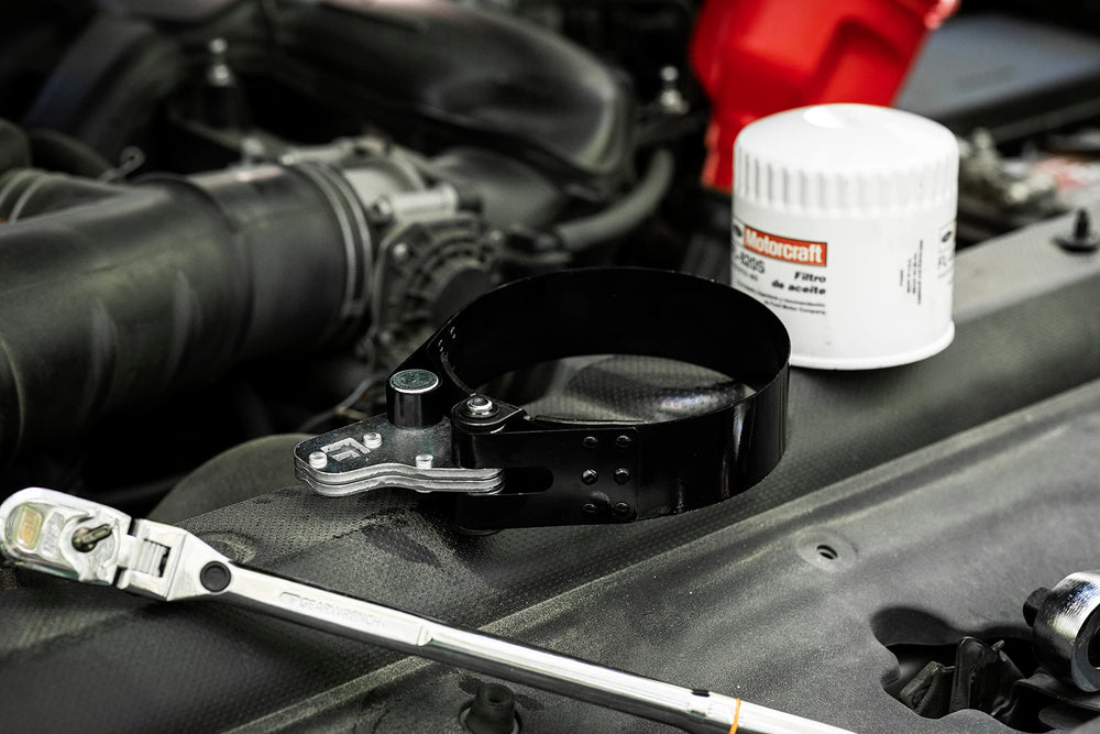 GEARWRENCH wrench beside a 1/2" ratchet showing scale and compatibility benefit