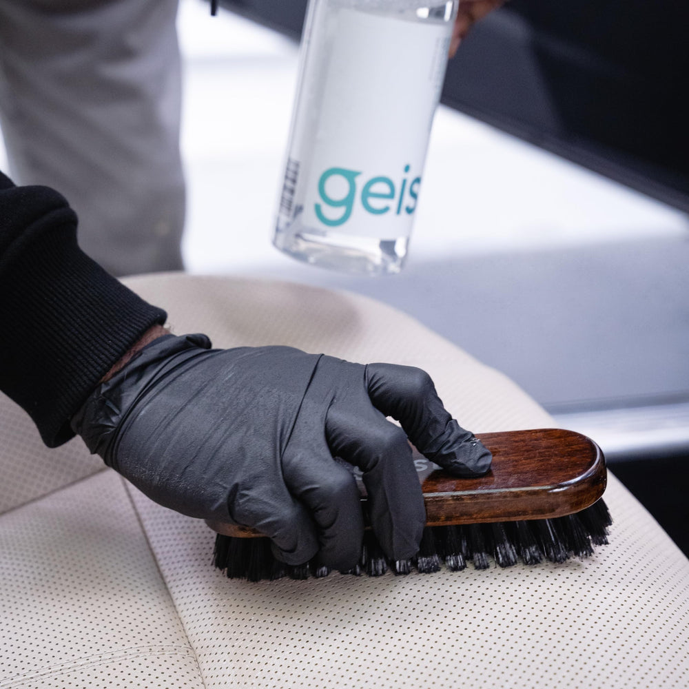 Geist cleaner applied to sofa in a living room for safe surface care