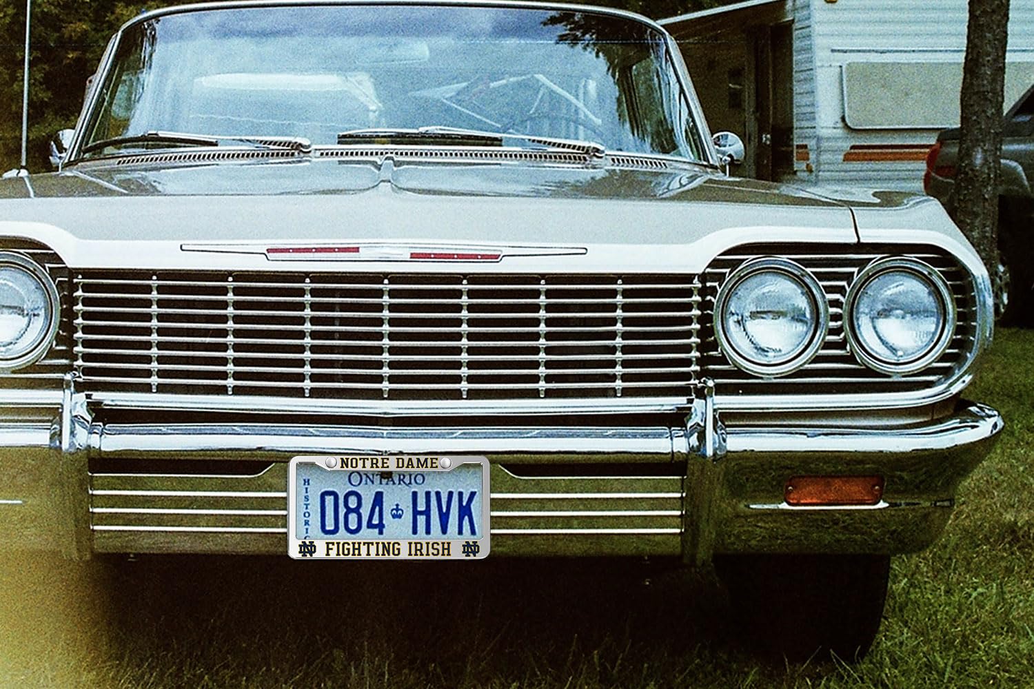 Generic frame installed on a sedan displaying team pride and clean vehicle styling
