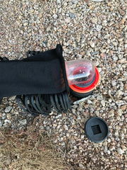 Generic brand sleeve in use covering hose couplings for cleaner, safer hookups