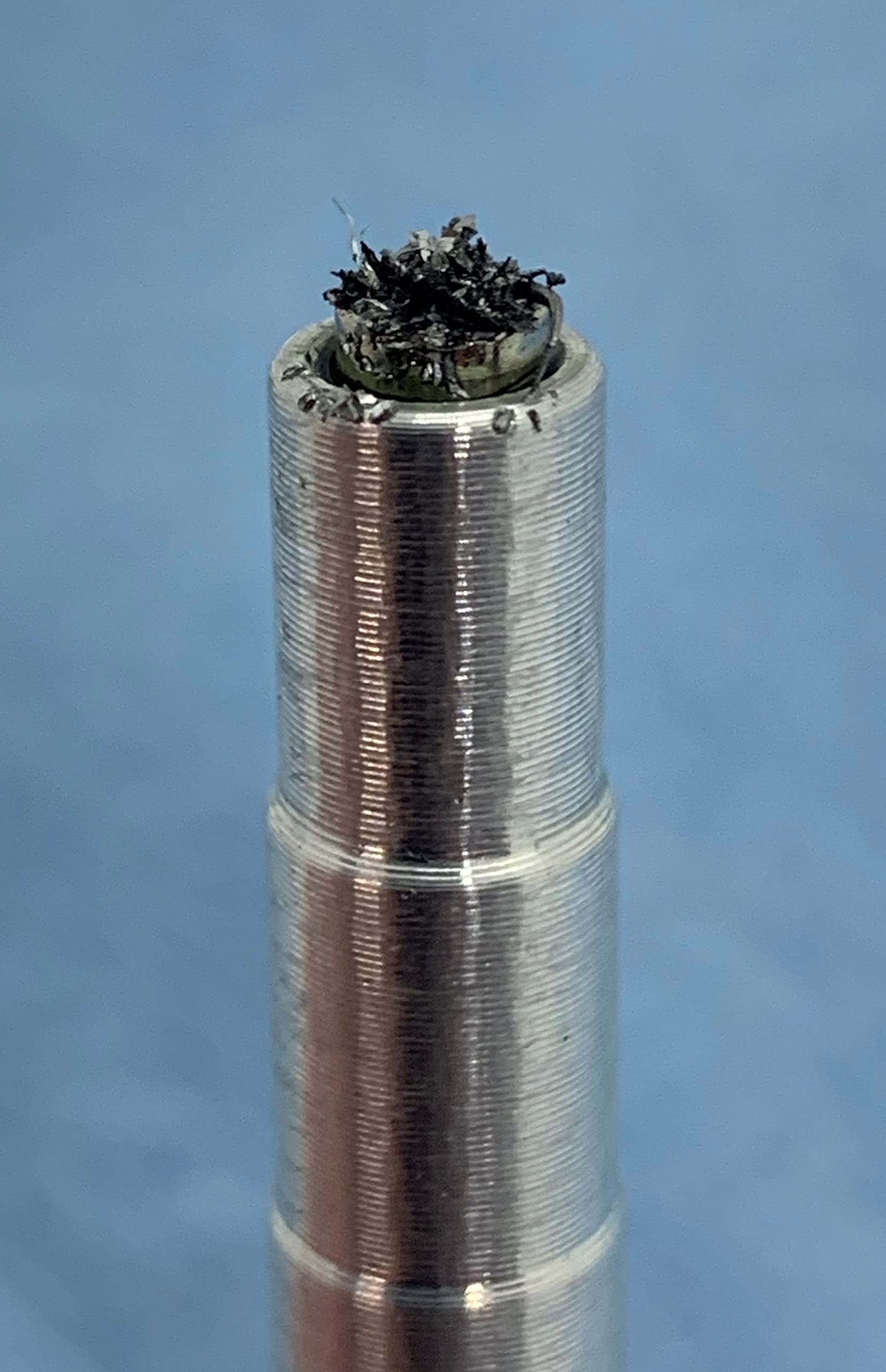 GenExhaust hexagonal body detail highlighting grip and easy removal benefit