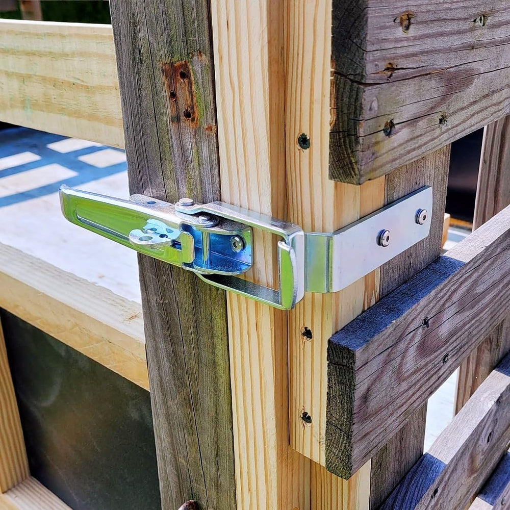 GMKD mounted on trailer in use demonstrating secure gate retention during travel