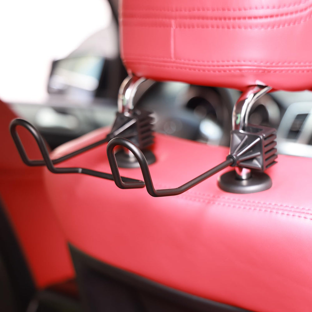 GODLIY mounted on truck headrest showing secure clamp and steady transport benefit