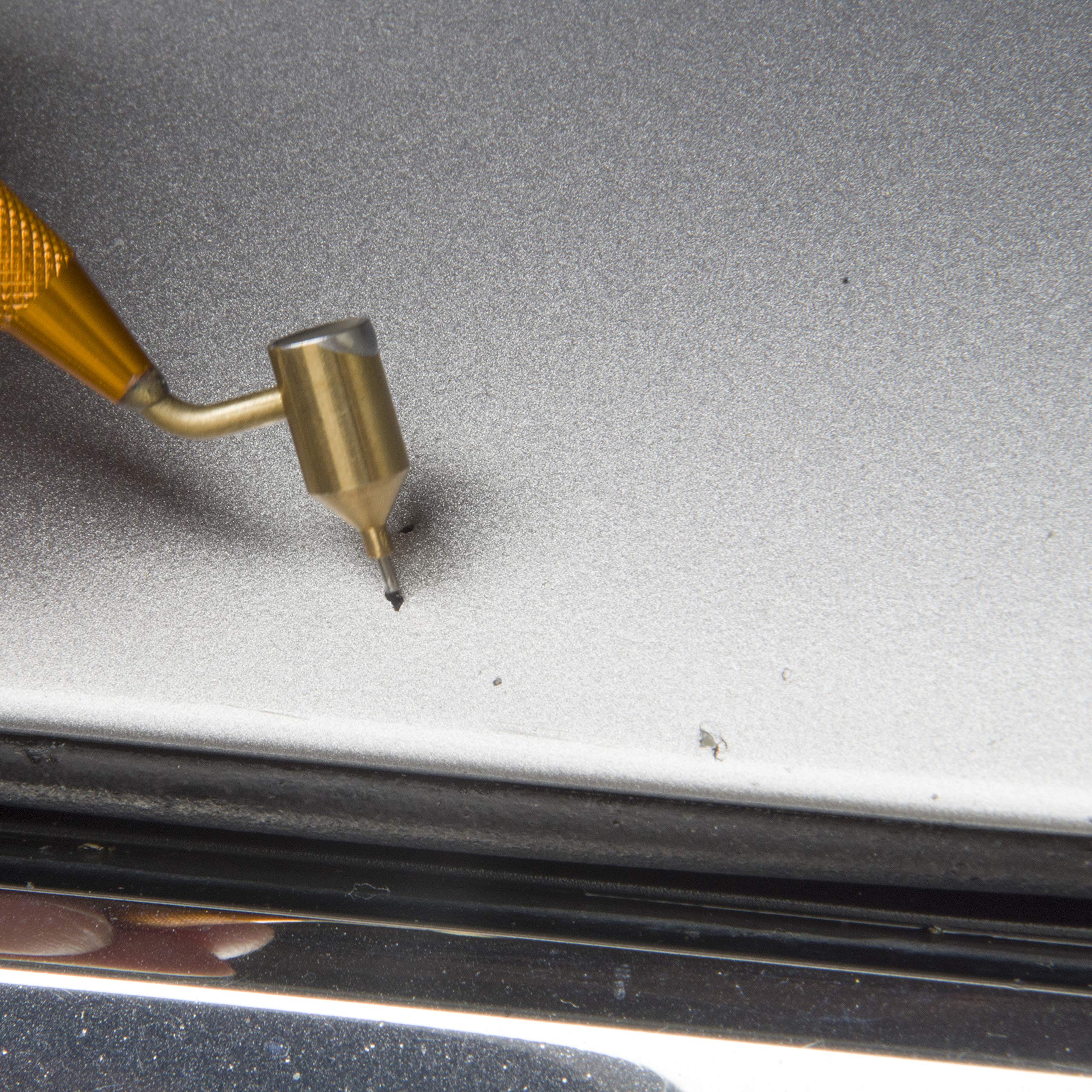 Gold Label Detailing size comparison against coin showing compact portable scale