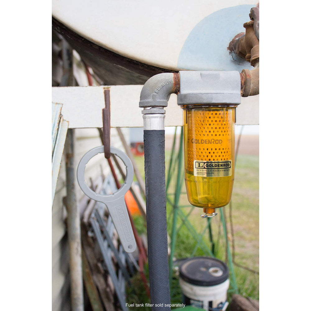 Goldenrod wrench being used to loosen a fuel filter bowl safely