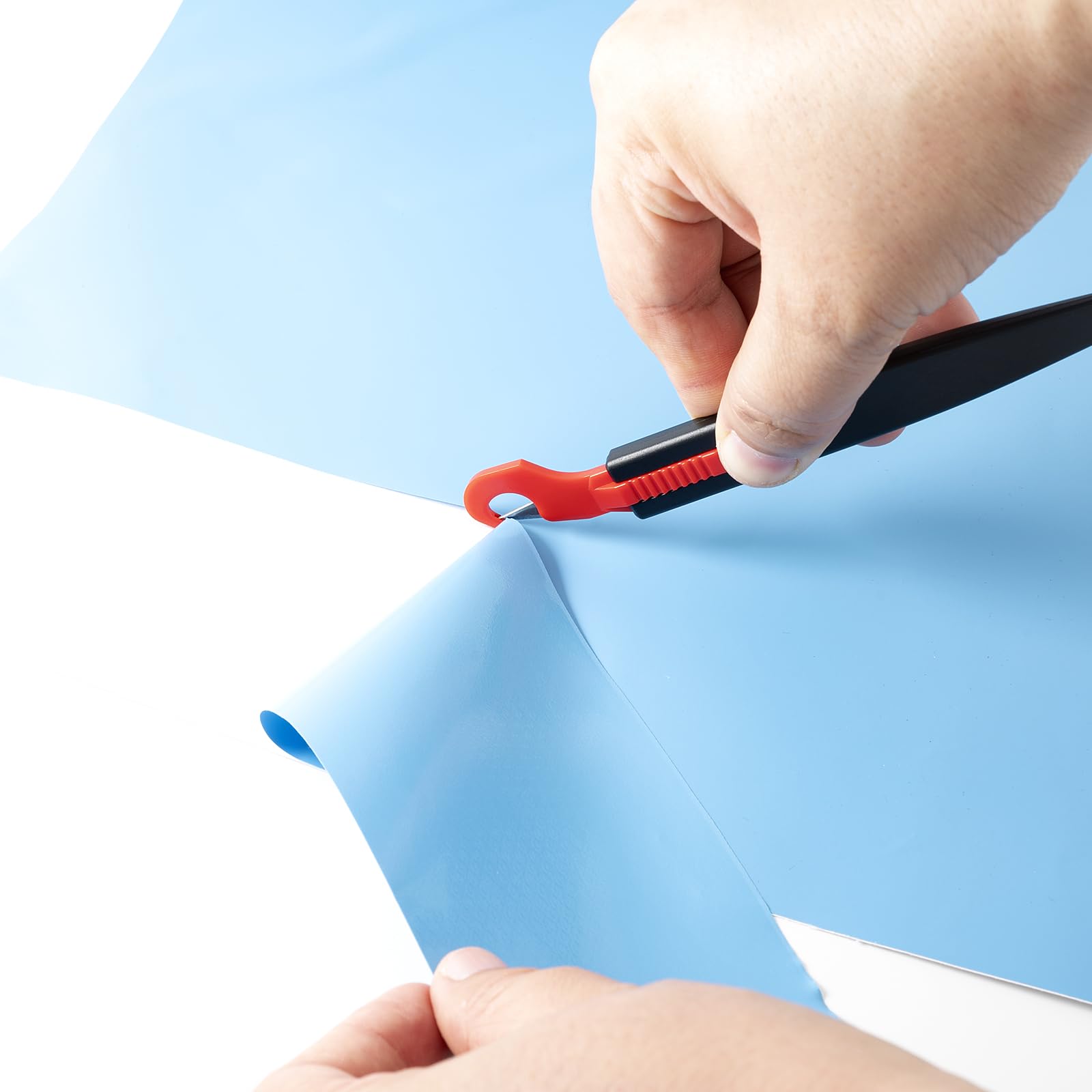 Gomake cutter next to ruler showing compact size and professional control advantage