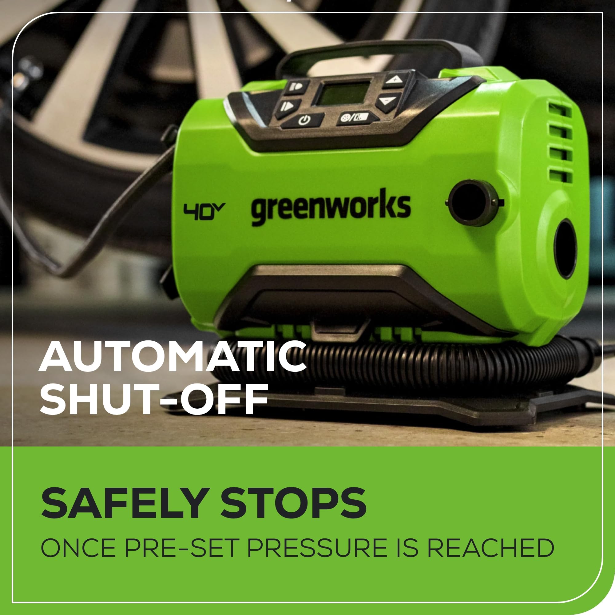 Greenworks inflator connected to car tire providing quick roadside inflation
