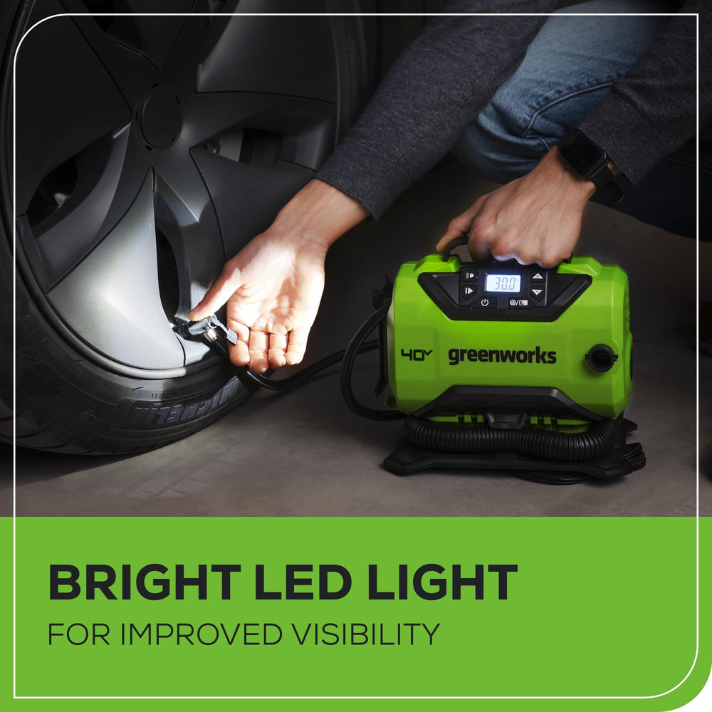 Greenworks inflator stored in trunk showing portability for travel