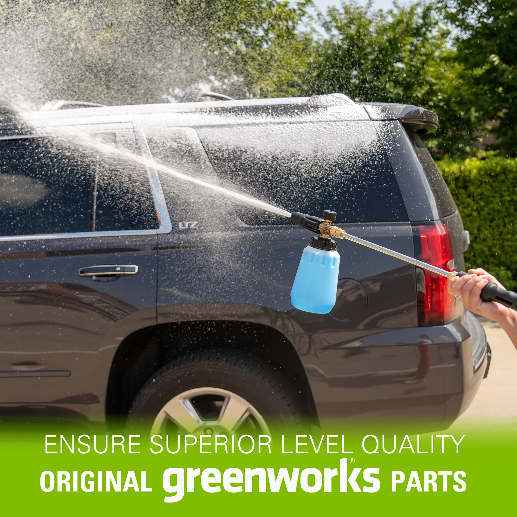 Greenworks cannon spraying thick foam on car for better pre-wash cleaning benefit