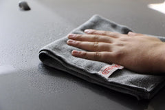 Gtechniq MF1 folded cloth close-up showing soft edges and lint-free finish benefit
