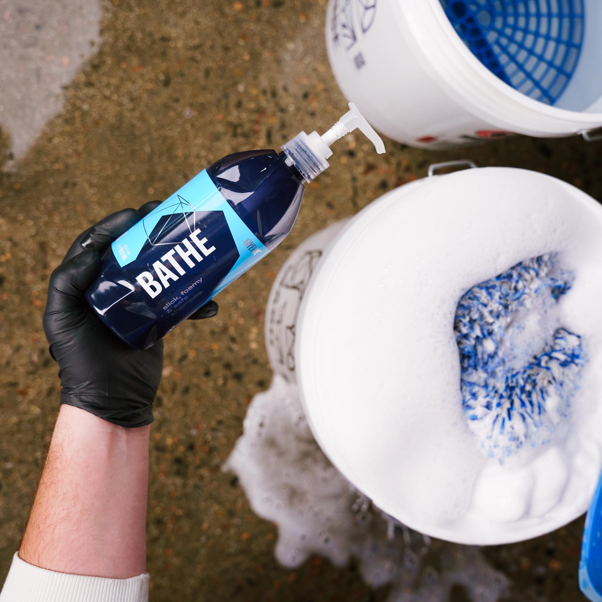Gyeon Bathe in outdoor driveway wash scene, ideal for routine maintenance