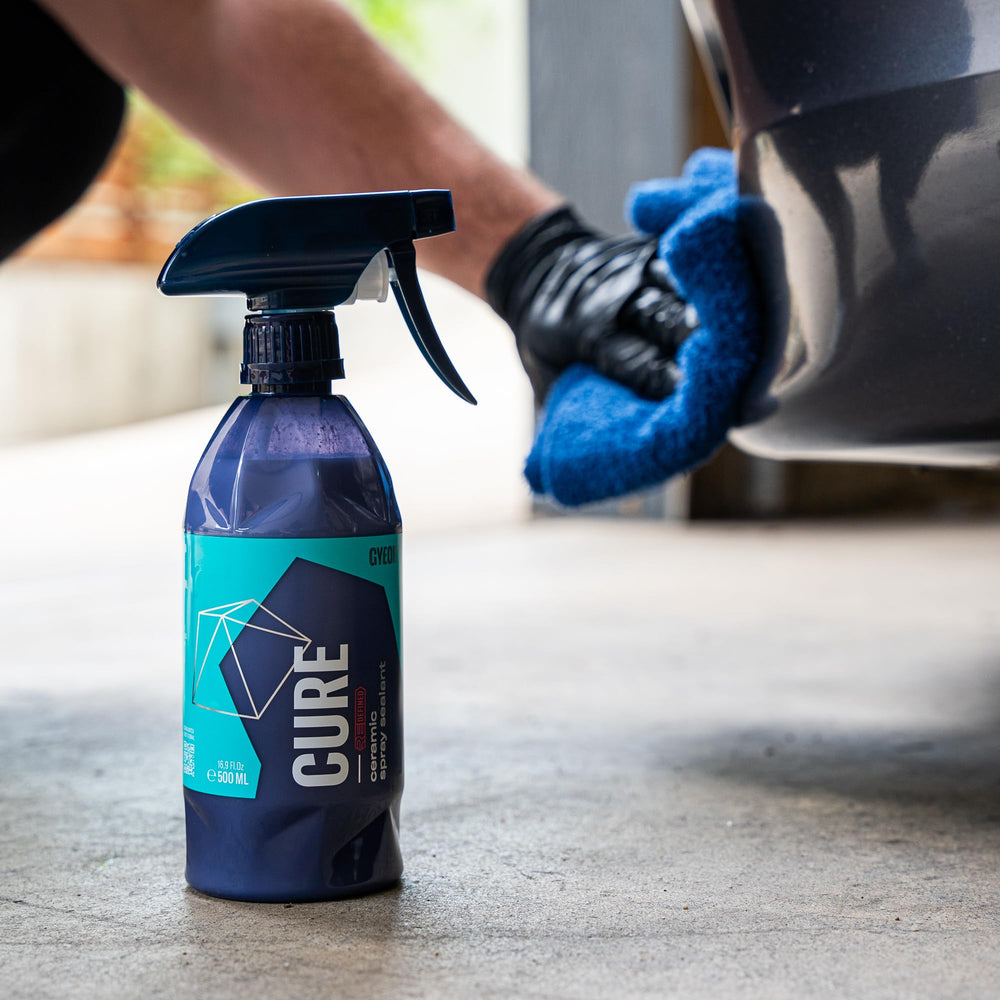 GYEON Cure used on parked car in sunlight showing enhanced shine benefit