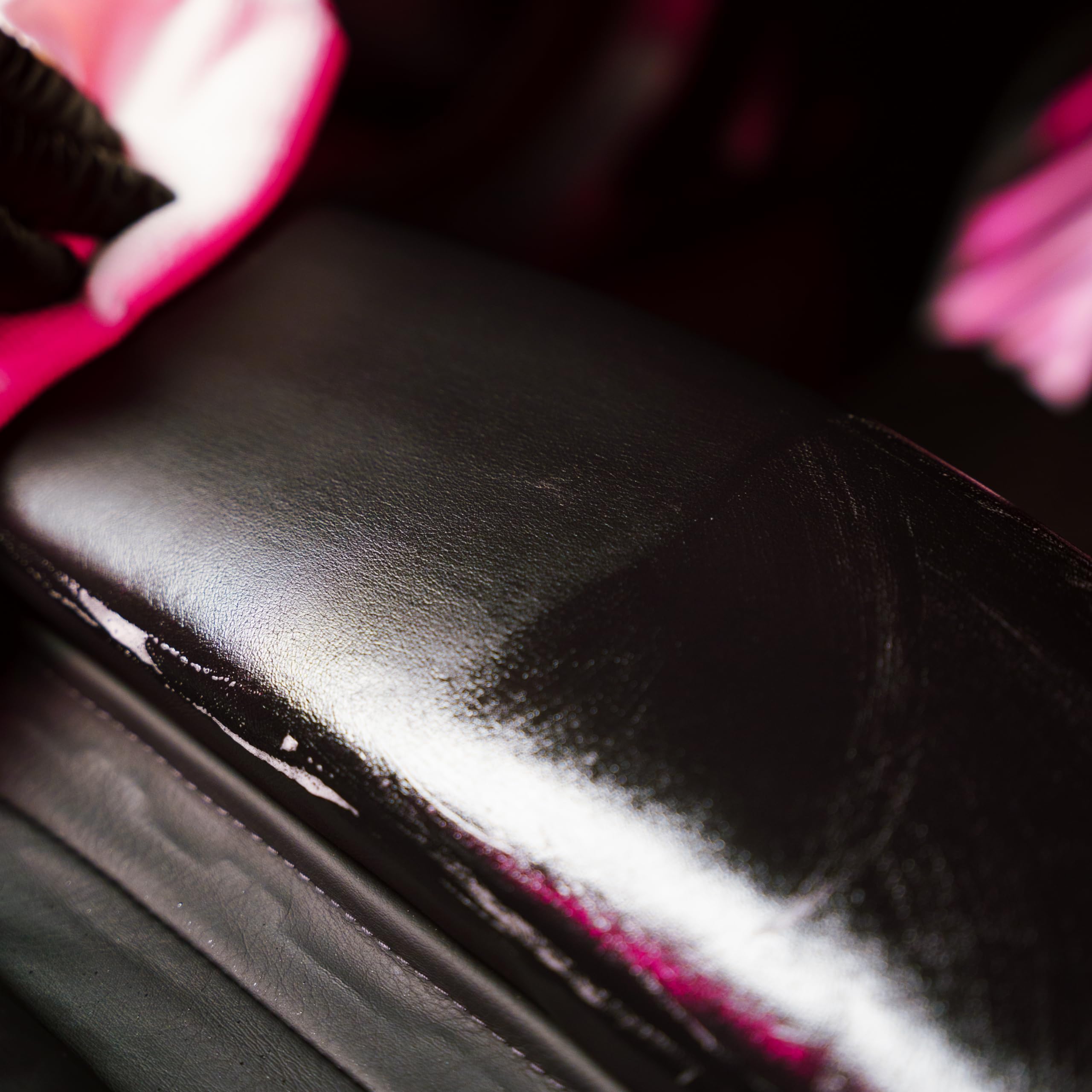 Gyeon cleaned leather showing dry matte finish ready for coating