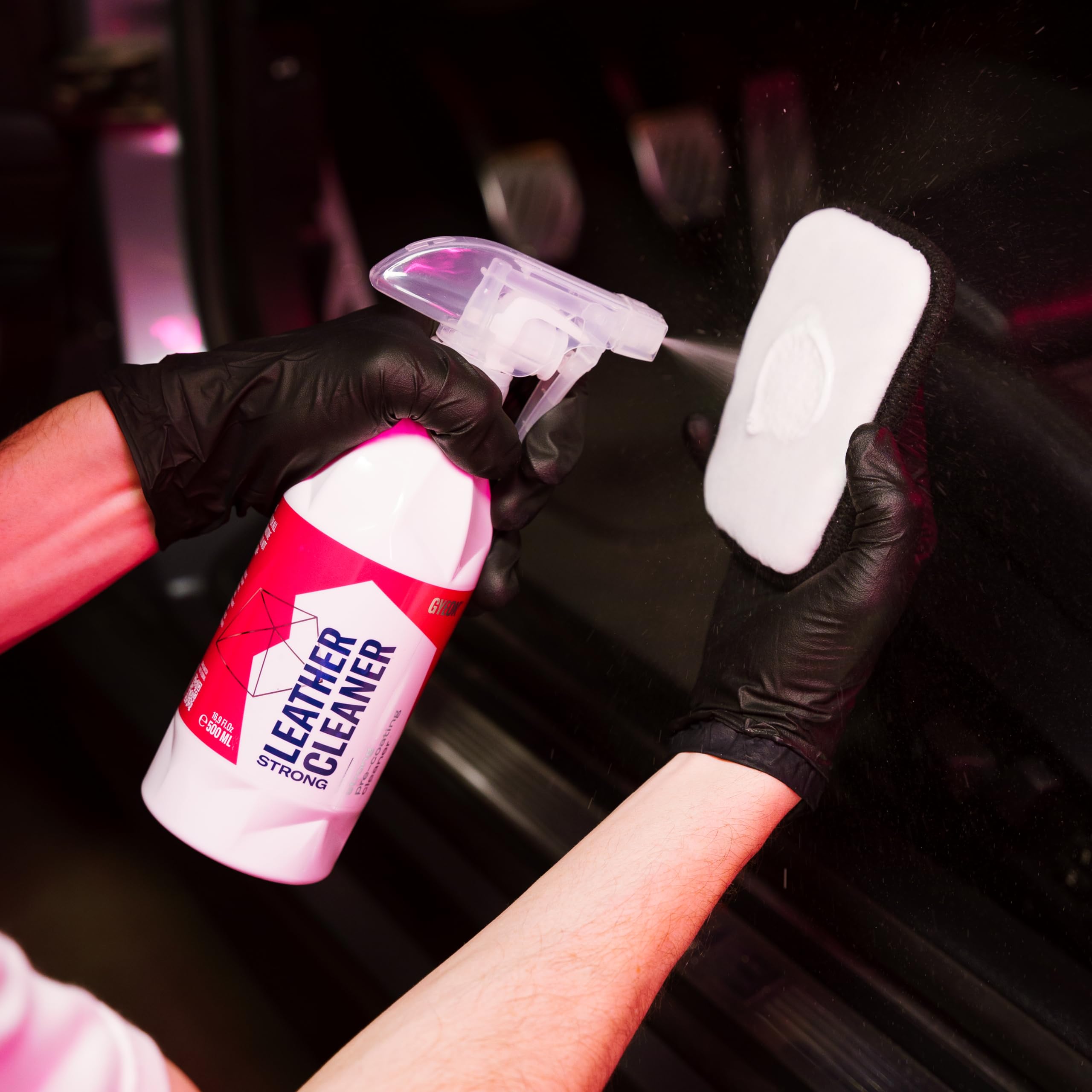 Gyeon solution poured onto microfiber towel for controlled application