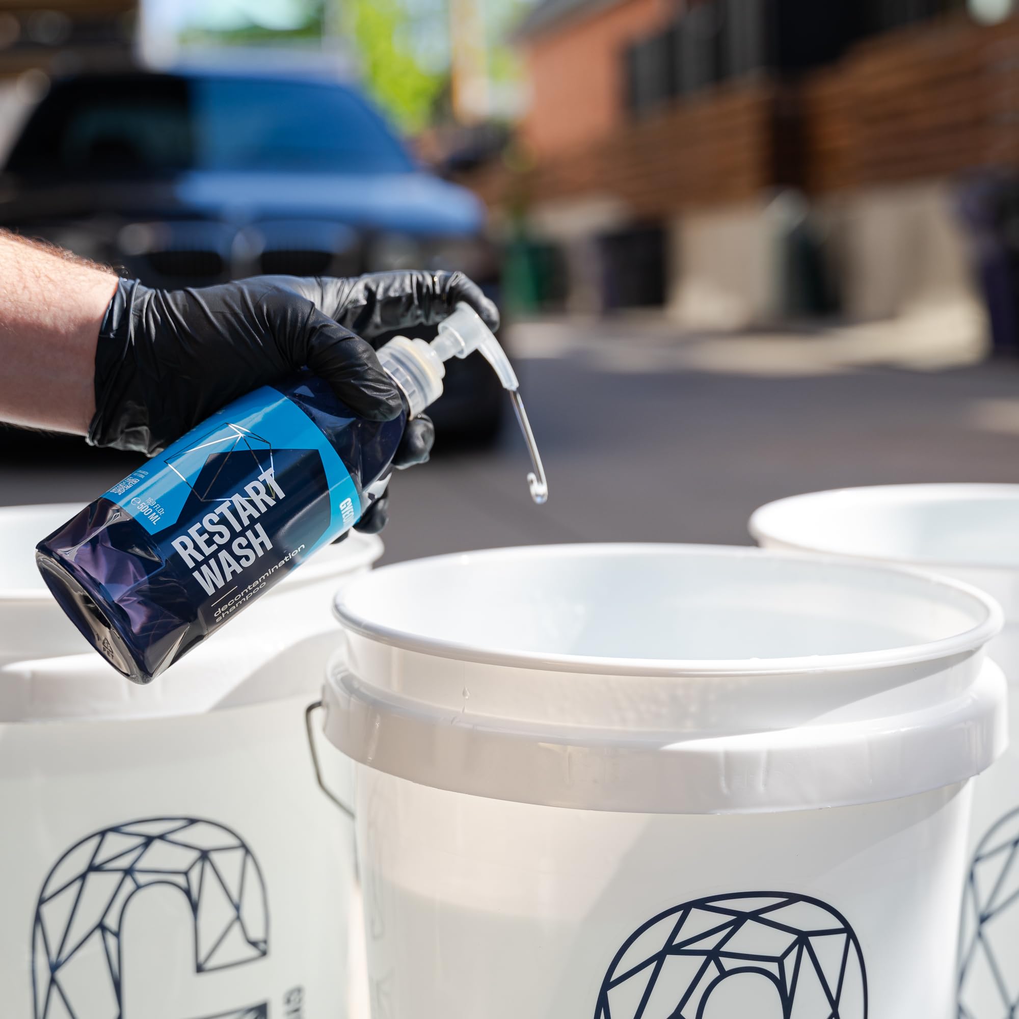 Gyeon Restart Wash bucket wash setup with mitt showing lubricated, scratch‑safe benefit