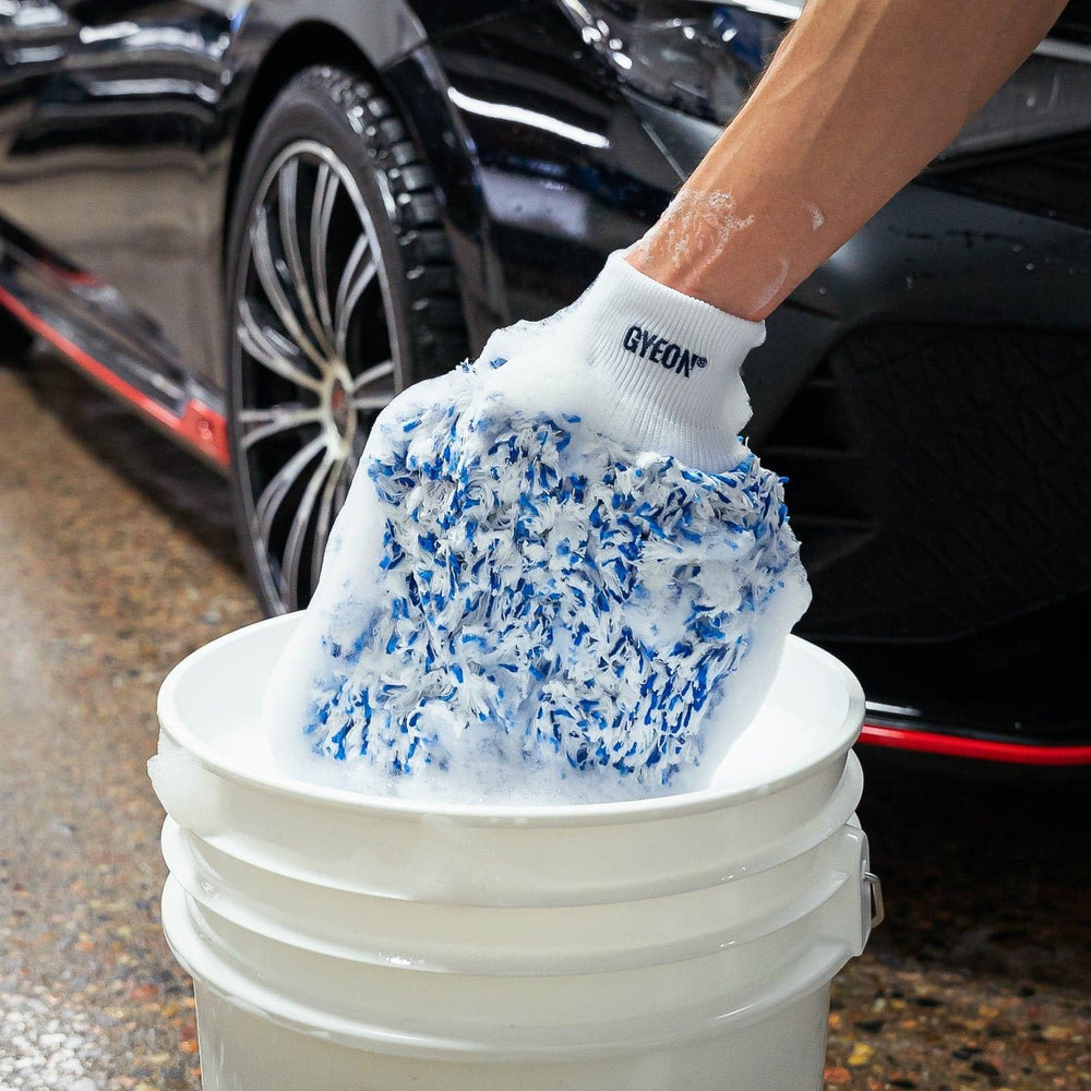 Gyeon mitt in hand showing true scale and secure fit advantage