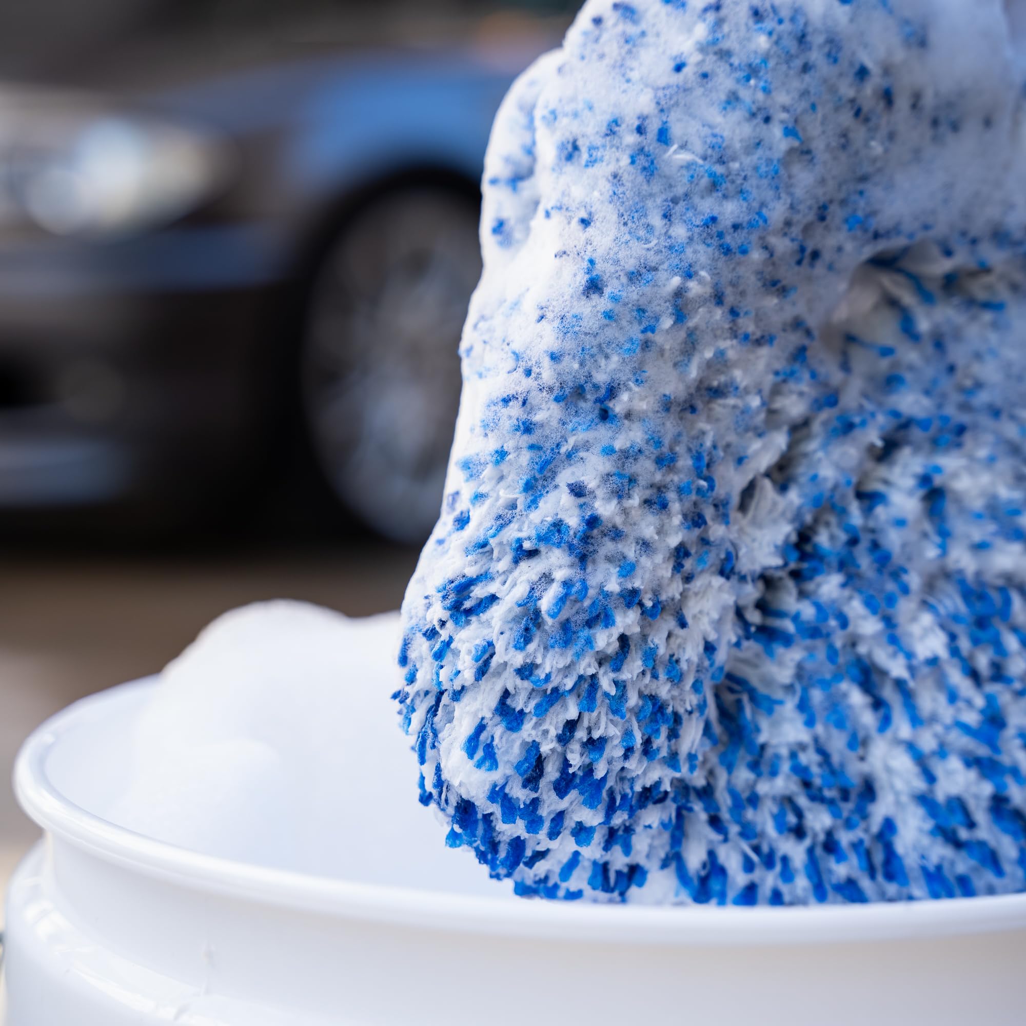 Gyeon mitt in a car wash lifestyle scene improving wash results