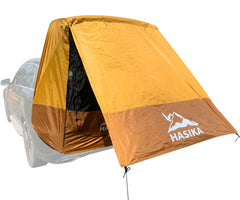 HASIKA front view showing tent attached to SUV and providing shaded area