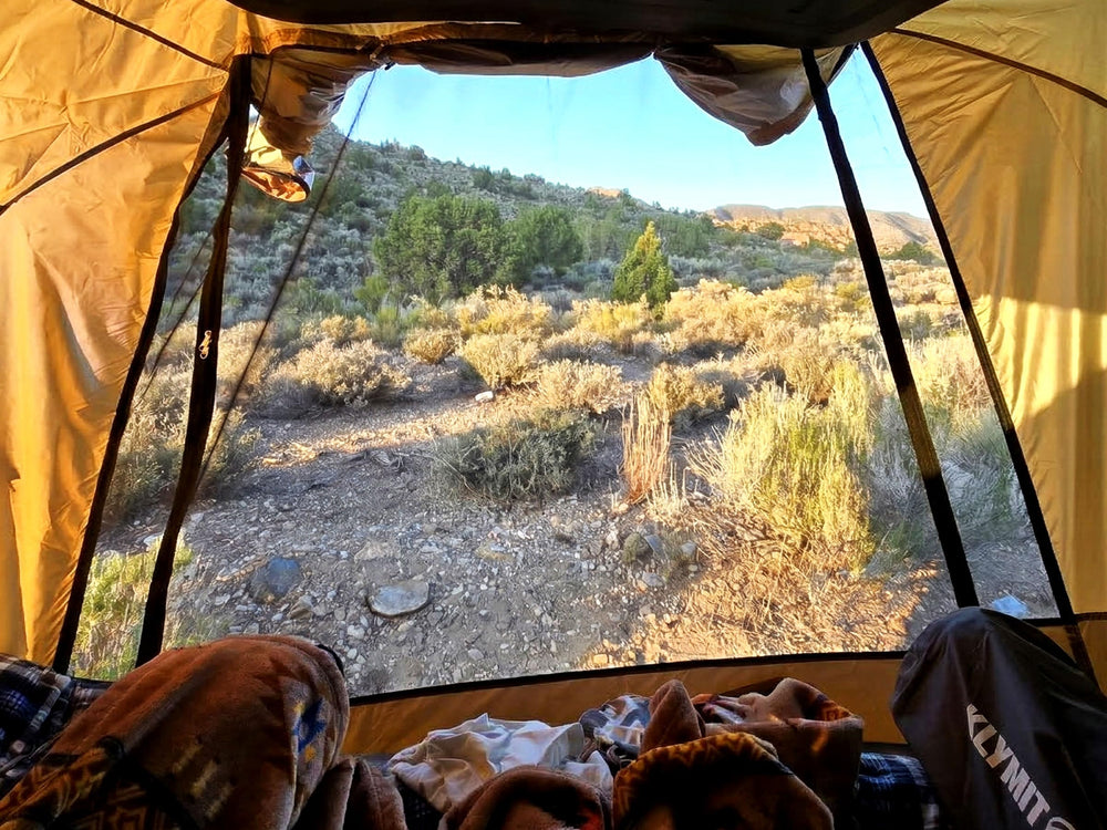 HASIKA tent at night with lantern creating cozy sheltered campsite lighting