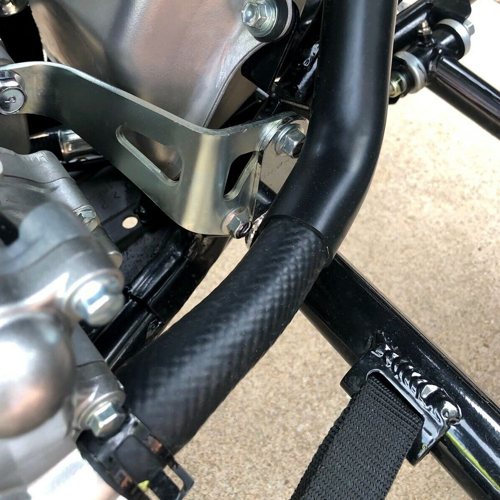 HECASA nerf bars in use with rider cornering for added confidence