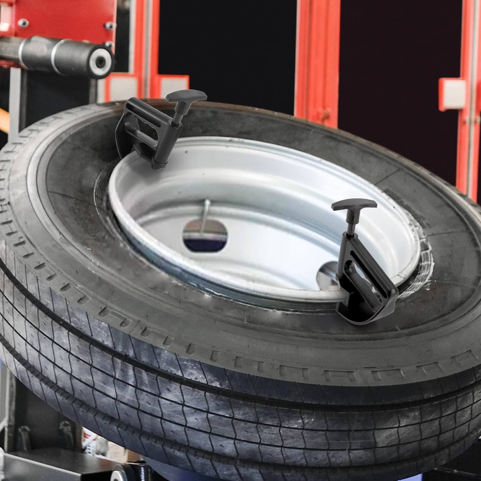 Hedume clamps on garage bench near tire tools, speeds routine tire changes