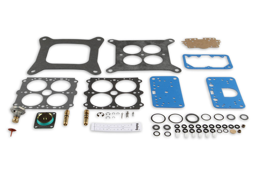 Holley parts tray layout with components organized for rebuild