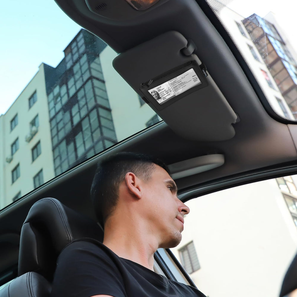 Homakover visor pocket on dashboard in car interior showing organized cabin benefit