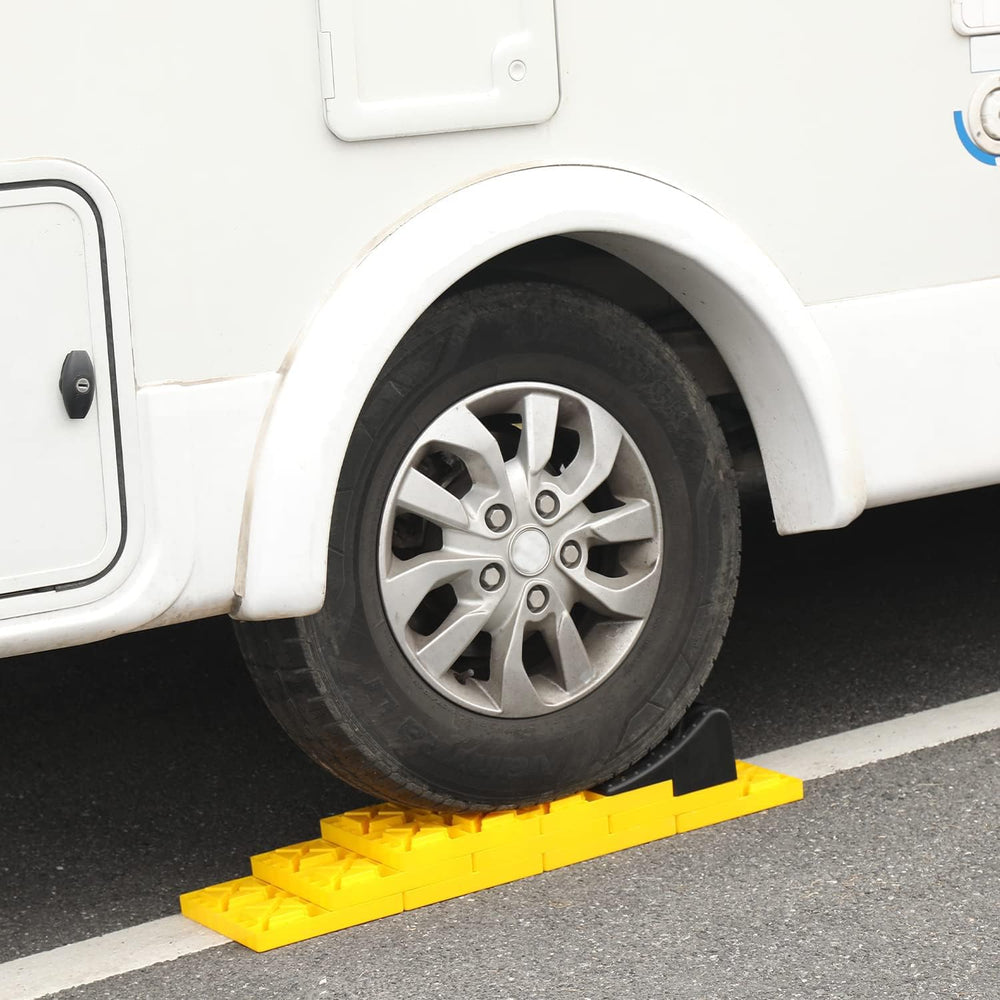 Homeon Wheels in-use image of camper gently driving onto blocks for level alignment