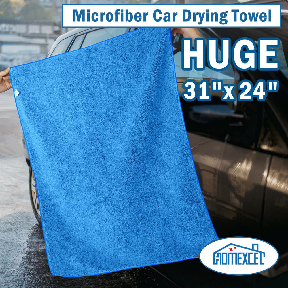 HOMEXCEL towel in hand demonstrating large 31x24 inch scale and coverage
