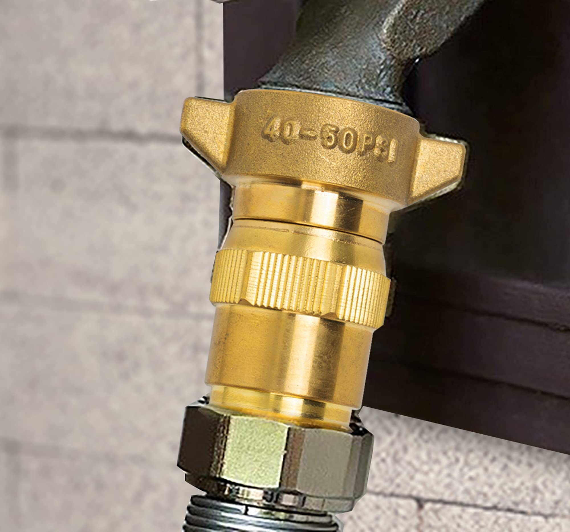 Hourleey connected to campground spigot demonstrating secure pressure control