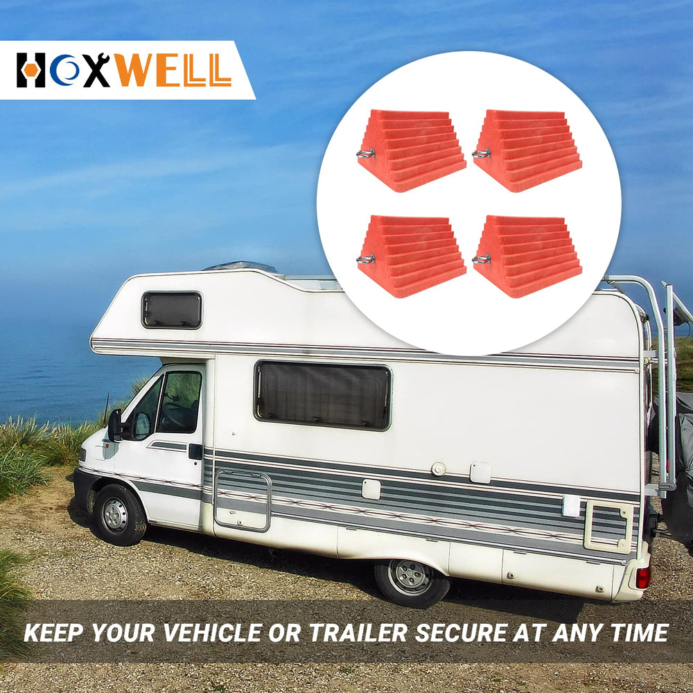 HOXWELL chock next to RV wheel at campsite showing visible safety aid