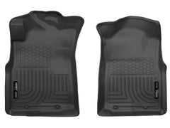 Husky Liners driver-side mat showing precise fit and floor protection