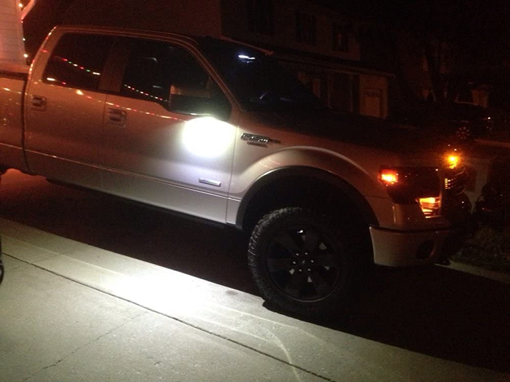 iJDMTOY night projection on ground showing clearer entry illumination and safer footing
